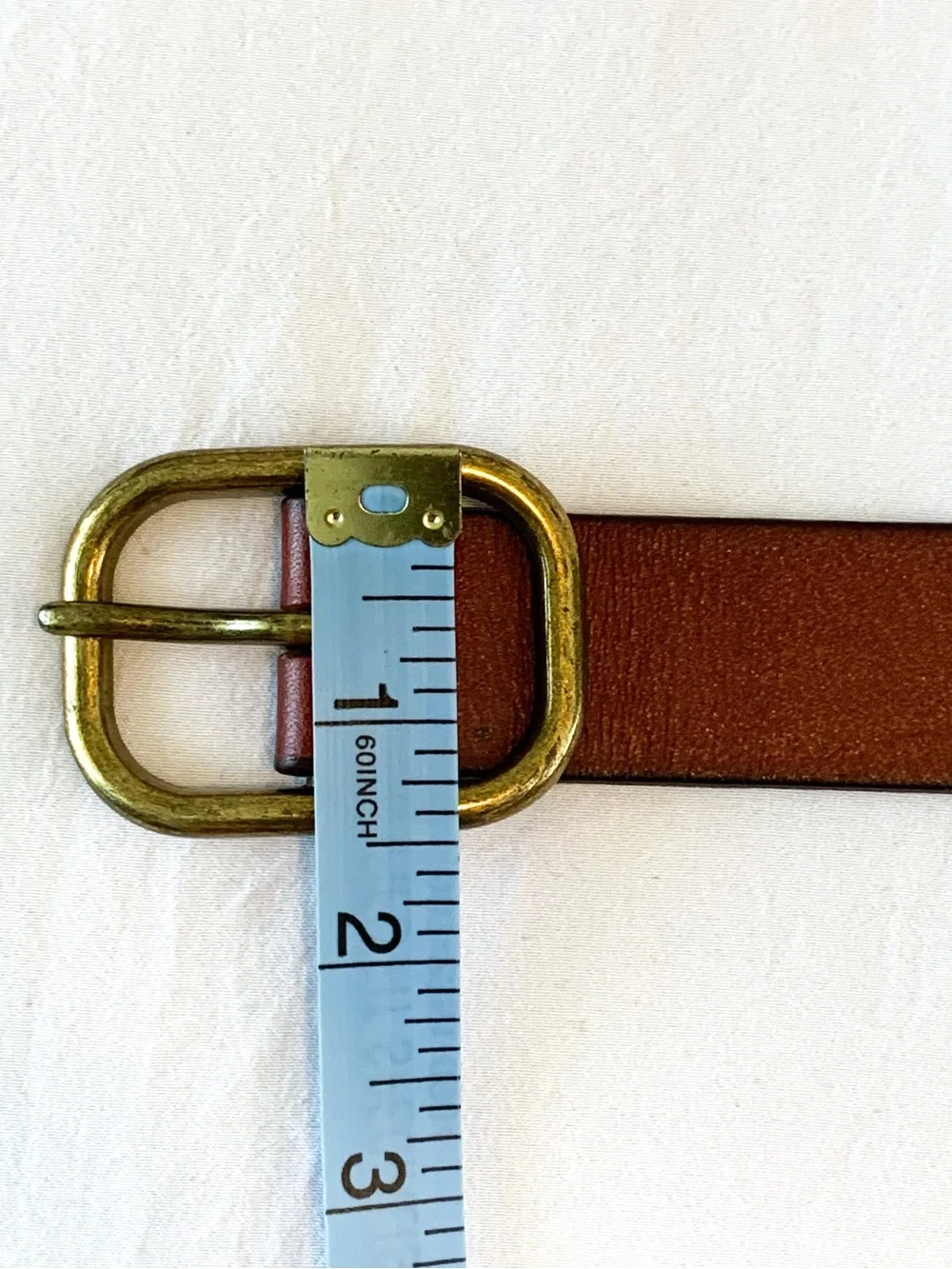 Gap leather belt in cognac red-brown color with brass tone buckle, medium